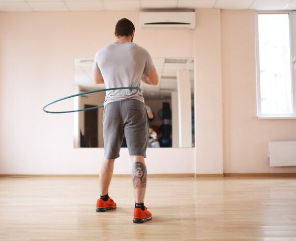 Spinning a hoop helps a man improve his power