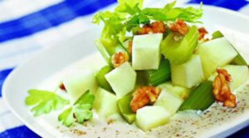 Apple salad with celery and walnuts